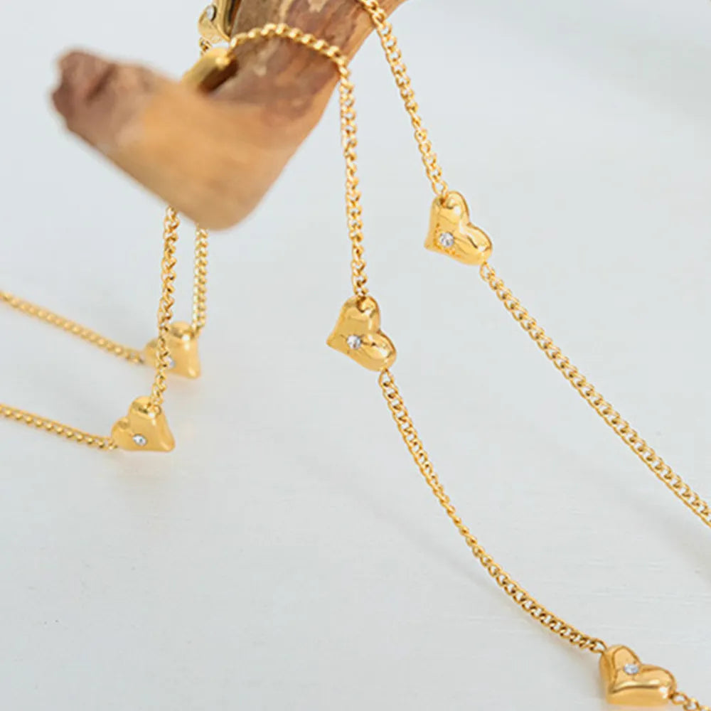 Collar de corazón de circonita y acero de titanio