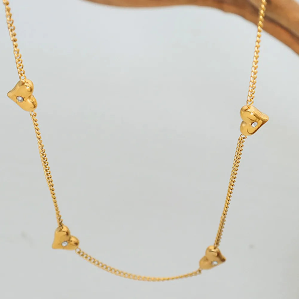 Collar de corazón de circonita y acero de titanio