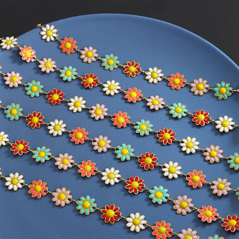 Collar de flor con gotas de aceite de acero de titanio