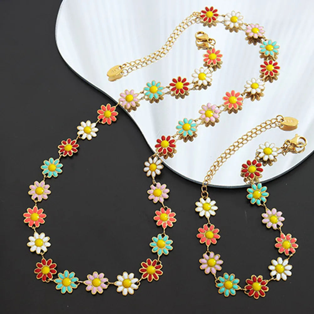 Collar de flor con gotas de aceite de acero de titanio